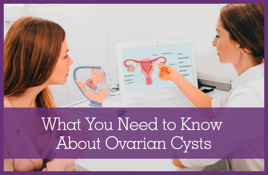 OBGYN specialist explaining to a patient everything she needs to know about ovarian cysts