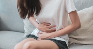 Woman with stomach pain