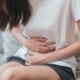 Woman with stomach pain