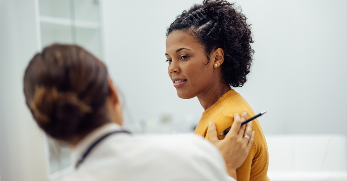 Woman talking to her doctor