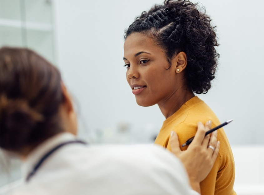 Woman talking to her doctor