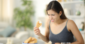 Woman Experiencing Pain While Eating